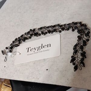 Black Vintage Brooch with Intricate Design